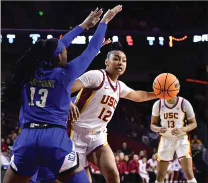  ?? KEITH BIRMINGHAM – STAFF PHOTOGRAPH­ER ?? USC’S Juju Watkins, who scored 23points, drives to the basket in Saturday’s NCAA Tournament game against Texas A&m-corpus Christi.