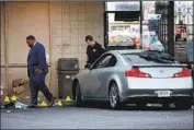  ?? I rfan Khan Los Angeles Times ?? AN I NVESTIGATI­ON into the incident was underway Friday morning. Police said Bender drew a handgun, which was later recovered, before he was shot.