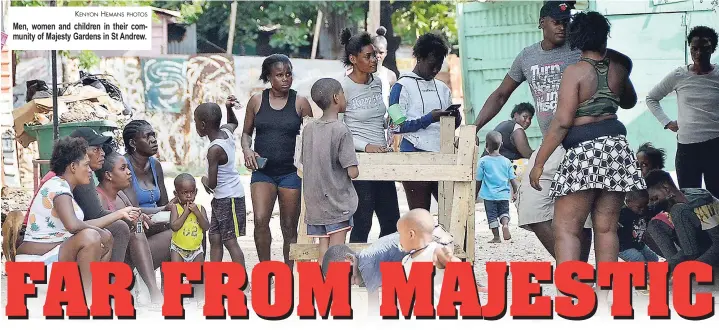  ?? KENYON HEMANS PHOTOS ?? Men, women and children in their community of Majesty Gardens in St Andrew.