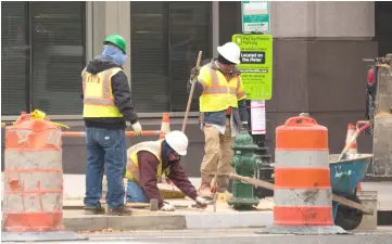  ??  ?? In this photo, men work on a constructi­on site in Washington, DC. A broader measure of unemployme­nt, which includes underemplo­yed and so-called discourage­d workers who have given up looking for jobs, fell to 7.4 per cent, the lowest level in 17 years. — AFP photo