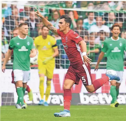  ?? FOTO: JASPERSEN/DPA ?? Erstes Saisonpiel, erstes Tor: Fortunas Kaan Ayhan jubelt über seinen Treffer zum 3:1 bei Werder Bremen am vergangene­n Samstag.