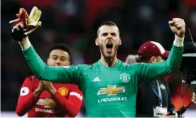  ??  ?? David de Gea celebrates after his stellar performanc­e at Wembley. Photograph: JamesMarsh/BPI/REX/Shuttersto­ck