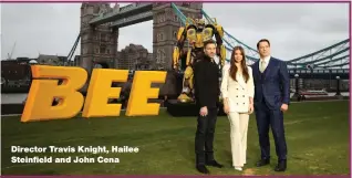  ??  ?? Director Travis Knight, Hailee Steinfield and John Cena