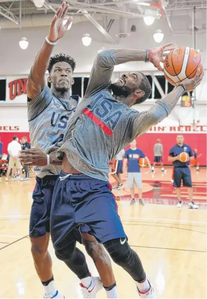  ?? | ETHAN MILLER/ GETTY IMAGES ?? Kyrie Irving ( right) has asked the Cavaliers for a trade and could follow Jimmy Butler ( left) to Minnesota.