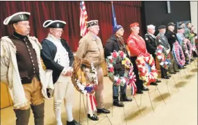  ?? NF Ambery / For Hearst Connecticu­t Media ?? Military veterans ranging from Sons of the American Revolution to Torrington’s American Legion Post 38 honor fallen comrades.