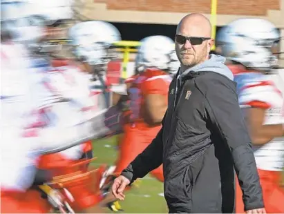  ?? KENNETH K. LAM/BALTIMORE SUN ?? Maryland offensive coordinato­r Matt Canada observes during the team’s first spring practice in College Park. “We got a lot of talent,” Canada said. “I’m excited. Today was day one. We’re going to figure out who we are, what our skill set is, whatever...