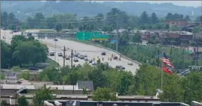  ?? Sebastian Foltz/Post-Gazette ?? Traffic moves through the Route 228 commercial corridor in Cranberry Township, July 15. Southern Butler County continues to be one of the fastest growing parts of the state.