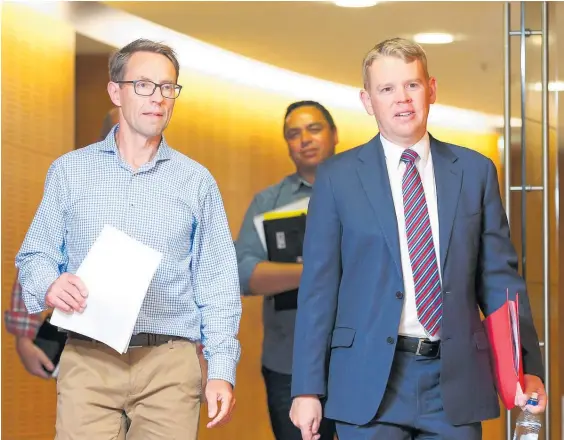  ?? Photo / Getty Images ?? Director general of health Dr Ashley Bloomfield, left, and the Minister for Covid-19 Response Chris Hipkins on their way to yesterday’s press conference.