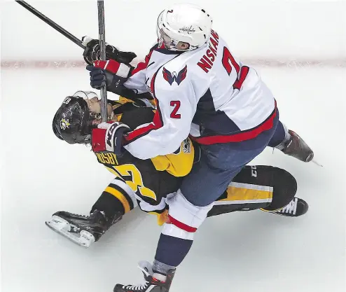  ?? GENE J. PUSKAR / THE ASSOCIATED PRESS ?? The Game 3 cross- check delivered by Washington Capitals defenceman Matt Niskanen to the face of Pittsburgh Penguins captain Sidney Crosby might have brought a premature end to the season for the game’s best player.