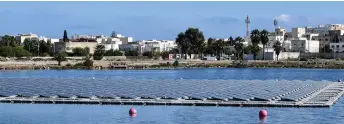  ?? — AFP photo ?? Photo shows a view of floating solar panels in a water reservoir in Le Kram, on the eastern edge of Tunisia’s capital Tunis.