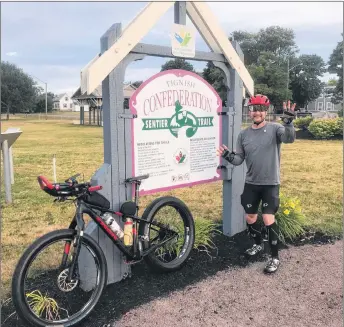  ?? SUBMITTED ?? Lloyd McLean of Lyons Brook, N.S., said he managed to complete the entire 273-kilometre Confederat­ion Trail in just under 12 hours last Friday. He’s pictured here at the start of his journey in Tignish.
