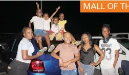  ?? ?? Kamogelo Thupana, Tshepo Letsoalo, Thato Mello and Leago Mogoswane settle on the roof of the car to get a better view while Kgaugelo Letsoalo, Tshego Thupana, Theto Mello and Oreneilele­rato Mello get ready for movie night. Left: Paulina Rametse and Alice Dagama enjoy icecream as they wait for
the movie to start.