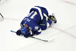  ?? AP Photo/John Bazemore ?? ● Tampa Bay Lightning left wing Ondrej Palat reacts after the Colorado Avalanche defeated the Lightning 2-1 in Game 6 of the Stanley Cup Finals on Sunday in Tampa, Fla.