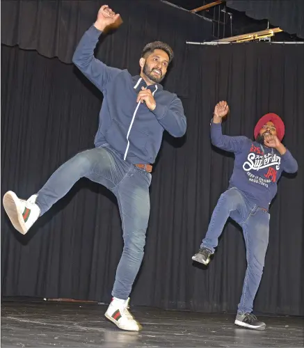  ?? SCOTT ANDERSON/SOUTHWEST BOOSTER ?? The dancing duo “Punjabi Empire” shared a high energy display of Indian dance during an Internatio­nal Education Week celebratio­n at Great Plains College on November 15.