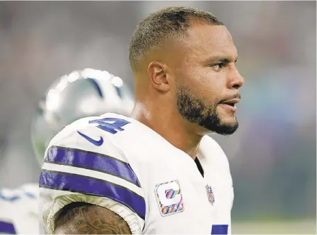  ?? DAVID J. PHILLIP/AP ?? Cowboys quarterbac­k Dak Prescott led his team to a 13-3 record in 2016 only to lose an epic playoff game to Green Bay.