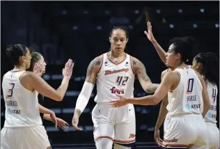  ?? THE ASSOCIATED PRESS FILE PHOTO — 2021 ?? WNBA stars Diana Taurasi, left, and Brittney Griner (42) will both return to the Phoenix Mercury next season.