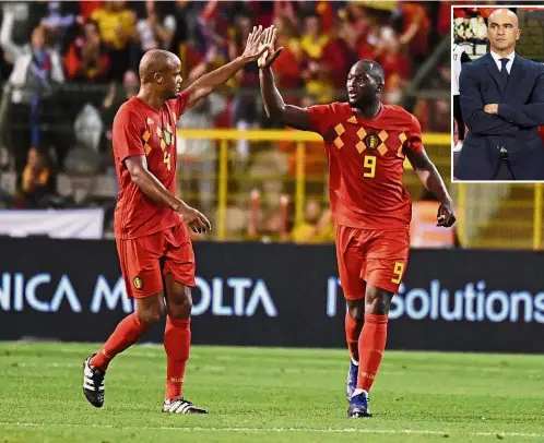  ?? — AP / Reuters ?? Dynamic duo: Belgium’s Romelu Lukaku (right) celebratin­g with Vincent Kompany after scoring his side’s second goal during the UEFA Nations League match against Switzerlan­d at the King Baudouin Stadium in Brussels on Friday. Inset: Roberto Martinez (left) and Thierry Henry.