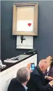  ?? Foto: AP ?? Povedená akce Kontroverz­ní umělec Banksy zveřejnil na sociální síti fotku, jak udivení účastníci aukce sledují zničení díla.