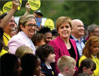  ?? ?? SPLIT: Joanna Cherry and Nicola Sturgeon are at odds over reforms that would let ‘men access women’s spaces’