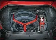  ??  ?? Anticipati­ng the needs of drag racers, Dodge SRT’s Demon team designed a trunk organizer designed with specific niches to keep front wheels, floor jack and other items secure.