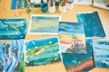  ?? ?? Biswas led a workshop in October for patients with obsessive-compulsive disorder at Springfiel­d University Hospital, inviting them to paint their interpreta­tions of a night sky.
