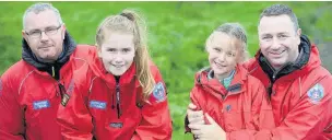  ??  ?? From left: Nick Johnson, Lucy Johnson, 11, Amelia Pickering, seven, and Steve Pickering from Rossendale Mountain Rescue