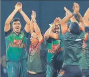  ?? AFP ?? ▪ Bangladesh's players did a nagin dance after beating Sri Lanka to enter the Nidahas Trophy final in Colombo.