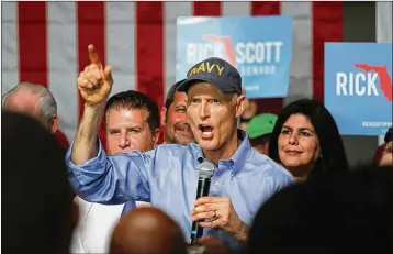  ?? GETTY IMAGES ?? Governor Rick Scott spent less-than-a-full enlistment in the service and what little time he did spend, he figured out how to make more money running a side business. It’s too bad all that can’t be embroidere­d on his Navy cap.