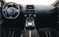  ??  ?? The 2019 Aston Martin Vantage’s logically arranged interior.