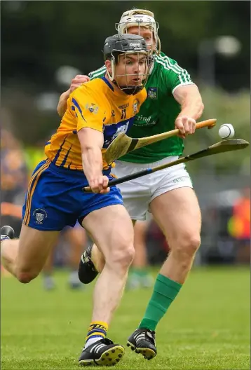  ??  ?? Tony Kelly of Clare in action against Cian Lynch of Limerick during the Munster hurling championsh­ip.