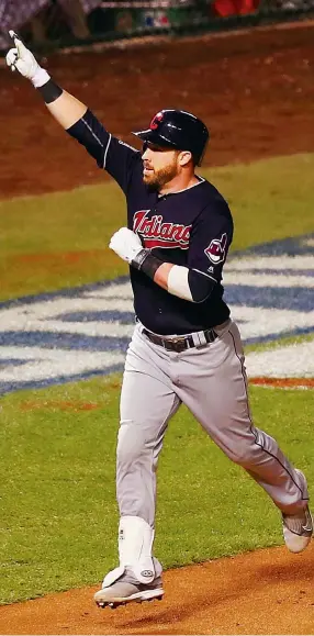  ?? Photo: AFP ?? Cleveland homeboy Jason Kipnis celebrates after hitting a three-run homer for the Indians.
