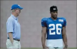  ?? PRESS JULIO CORTEZ — THE ASSOCIATED ?? New York Giants owner John Mara, left, talks to running back Saquon Barkley during NFL football training camp, Thursday in East Rutherford, N.J.