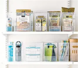  ?? THE CONTAINER STORE ?? These sturdy yet see-through Multi-Purpose Bins have handles and can store pantry items, notebooks, magazines and more. $5.99 to $8.99 each