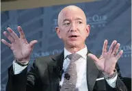  ?? CLIFF OWEN / THE ASSOCIATED PRESS FILES ?? Amazon’s Jeff Bezos made headlines with his prediction of delivery drones, but right now he’s focusing on traditiona­l vans and independen­t operators.