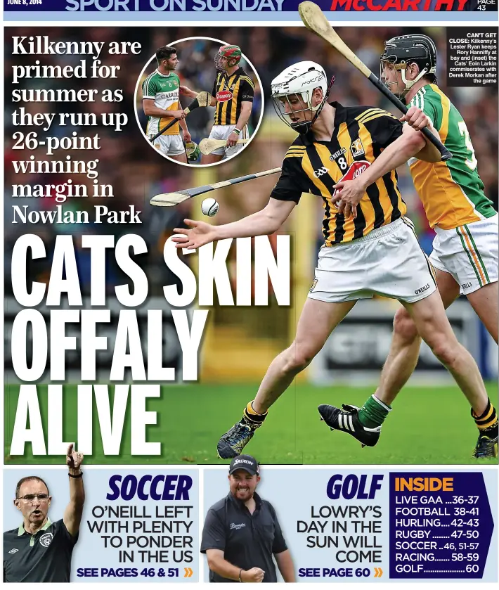  ??  ?? cAn’t Get cLoSe: Kilkenny’s Lester Ryan keeps
Rory Hanniffy at bay and (inset) the
Cats’ Eoin Larkin commiserat­es with Derek Morkan after
the game