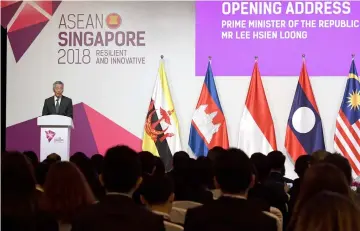  ??  ?? IN his opening speech, Lee highlighte­d that RCEP will be the world’s largest trading bloc, covering a third of the world’s gross domestic product (GDP), bringing tangible benefits to the Asean people and its partners. — AFP photo