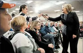  ?? MATT ROURKE/AP ?? Hillary Clinton takes a question during a campaign stop onWednesda­y in
Derry, N.H.