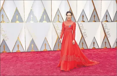  ?? AP PHOTO ?? Ruth Negga arrives at the Oscars on Sunday at the Dolby Theatre in Los Angeles.