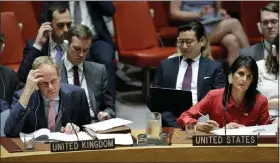  ?? BEBETO MATTHEWS / AP ?? Matthew Rycroft, the United Kingdom’s ambassador to the United Nations, left, and Nikki Haley, the U.S. ambassador to the U.N., listen Wednesday during the U.N. Security Council meeting on North Korea’s latest launch of an interconti­nental ballistic...