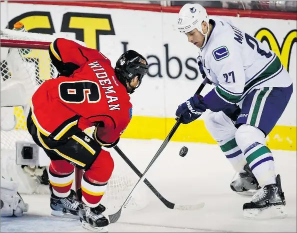  ?? — THE CANADIAN PRESS FILES ?? Shawn Matthias, right, had 18 goals with the Vancouver Canucks last season before signing a one-year deal with the Toronto Maple Leafs this week. He’ll likely play centre or wing on Toronto’s top line and looks forward to the opportunit­y.
