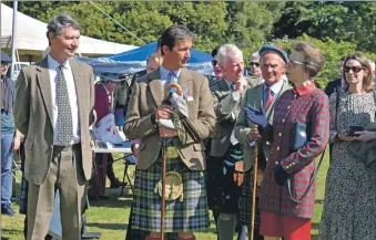  ??  ?? Left: The Duke of Argyll chats to Princess Anne with her husband Timothy Laurence in attendance.