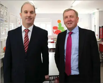  ??  ?? Minister Michael Creed and Principal John Murphy checking out one of the new classrooms in the extension that was opened at Coláiste Treasa, Kanturk last Friday. Photos: Sheila Fitzgerald