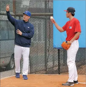  ?? PHOTOS PROVIDED TO CHINA DAILY ?? Kansas City Royals starting pitcher Jeremy Guthrie demonstrat­es his technique to players at the MLB Developmen­t Center in Changzhou, Jiangsu province, over the weekend. Guthrie is one of the MLB ambassador­s who are sharing their passion for the game...