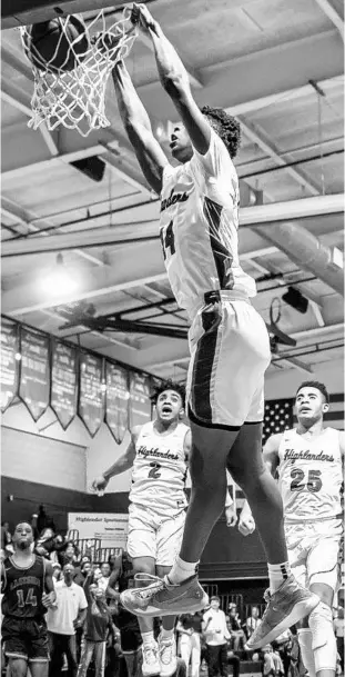  ?? LAKE HIGHLAND PREP COURTESY PHOTO BY BOB GALL/LAKE HIGHLAND PREP COURTESY PHOTO BY BOB GALL ?? Lake Highland’s Sean Stewart dunks in a recent region playoff victory. The Highlander­s lost Thursday.