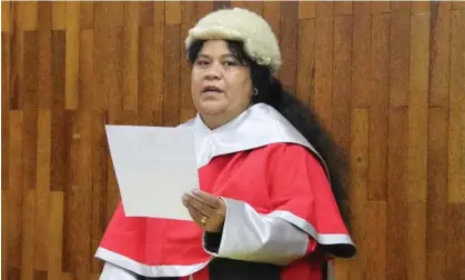  ?? Photograph: Kiribati president's office/Facebook ?? Tetiro Semilota during her swearing in as acting chief justice of Kiribati.