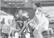  ?? MICHAEL LAUGHLIN/STAFF PHOTOGRAPH­ER ?? Dillard’s Kayla Burrows tries to get around Fort Myers’ Destanni Henderson during the first half of Friday’s game.