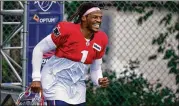  ?? STEVEN SENNE / AP ?? Patriots quarterbac­k Cam Newton, a former Westlake High star, steps onto the field at a training camp practice Thursday in Foxborough, Massachuse­tts.