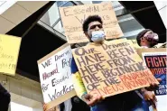  ?? STAFF PHOTO BY WYATT MASSEY ?? Elijah Locklin, 21, participat­es in a rally Sunday for CARTA to reinstate hazard pay for its drivers.