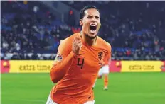  ?? AFP ?? Netherland­s’ defender Virgil van Dijk celebrates after scoring a goal during the 2-2 draw against Germany in the Uefa Nations League in Gelsenkirc­hen on Monday.