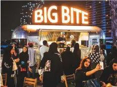  ?? Los Angeles Times ?? Saudi youth crowd the food truck section during the Land of O’hara festival in Jeddah.